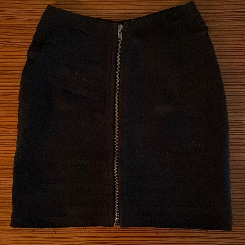 Urban Outfitters. High- wasted mini black shirt with zipper detail in front. XS.